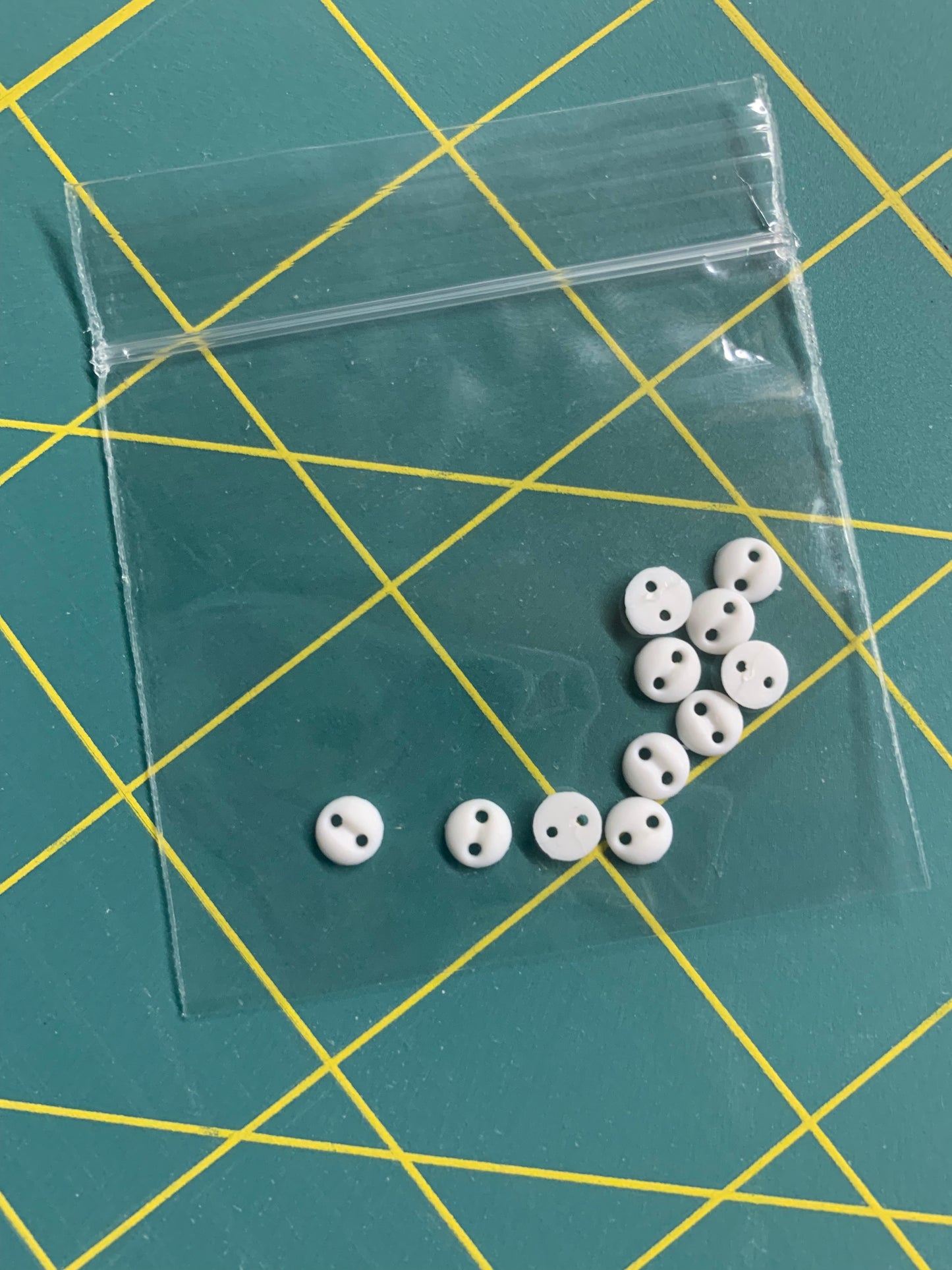 1/8" White Buttons